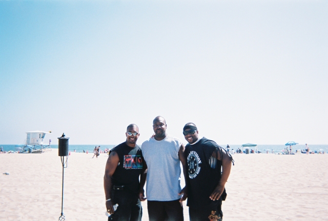Darnell Self(millionaire), Charles Robinson(me), Mike Humes(millionaire) playing football in Huntington Beach California June,2007 